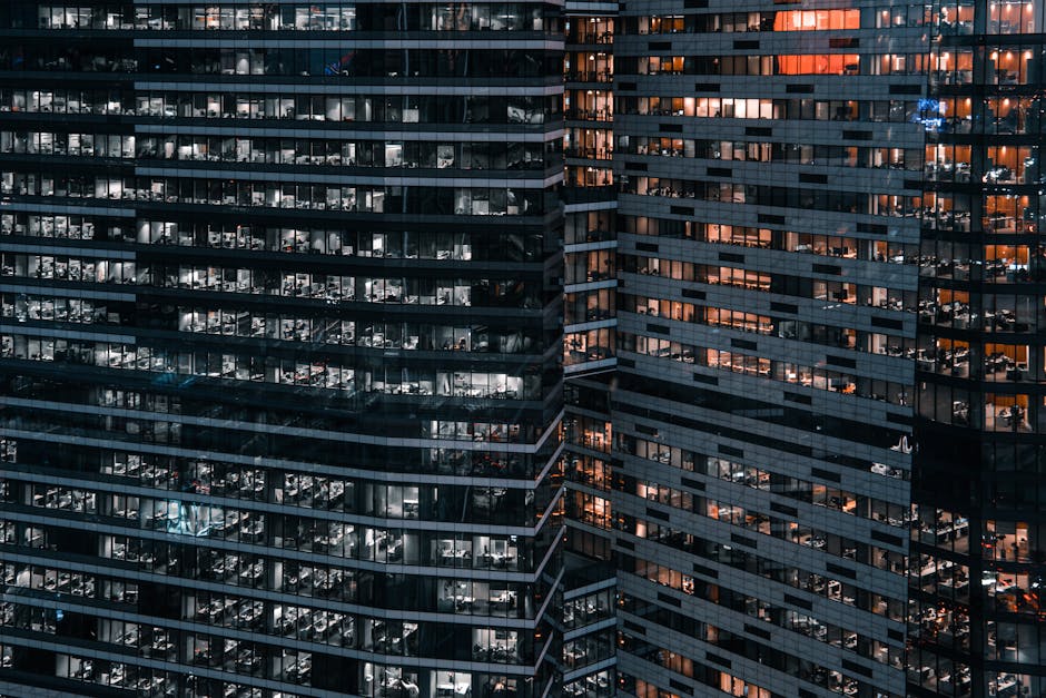 Close-up view of modern office buildings in Moscow, showcasing urban architecture at night