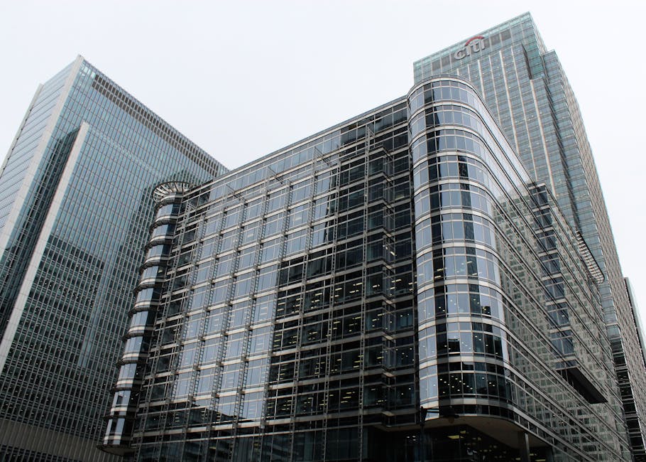 Low angle view of modern glass skyscrapers in an urban setting